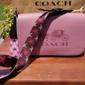 Coach purse with stars design strap